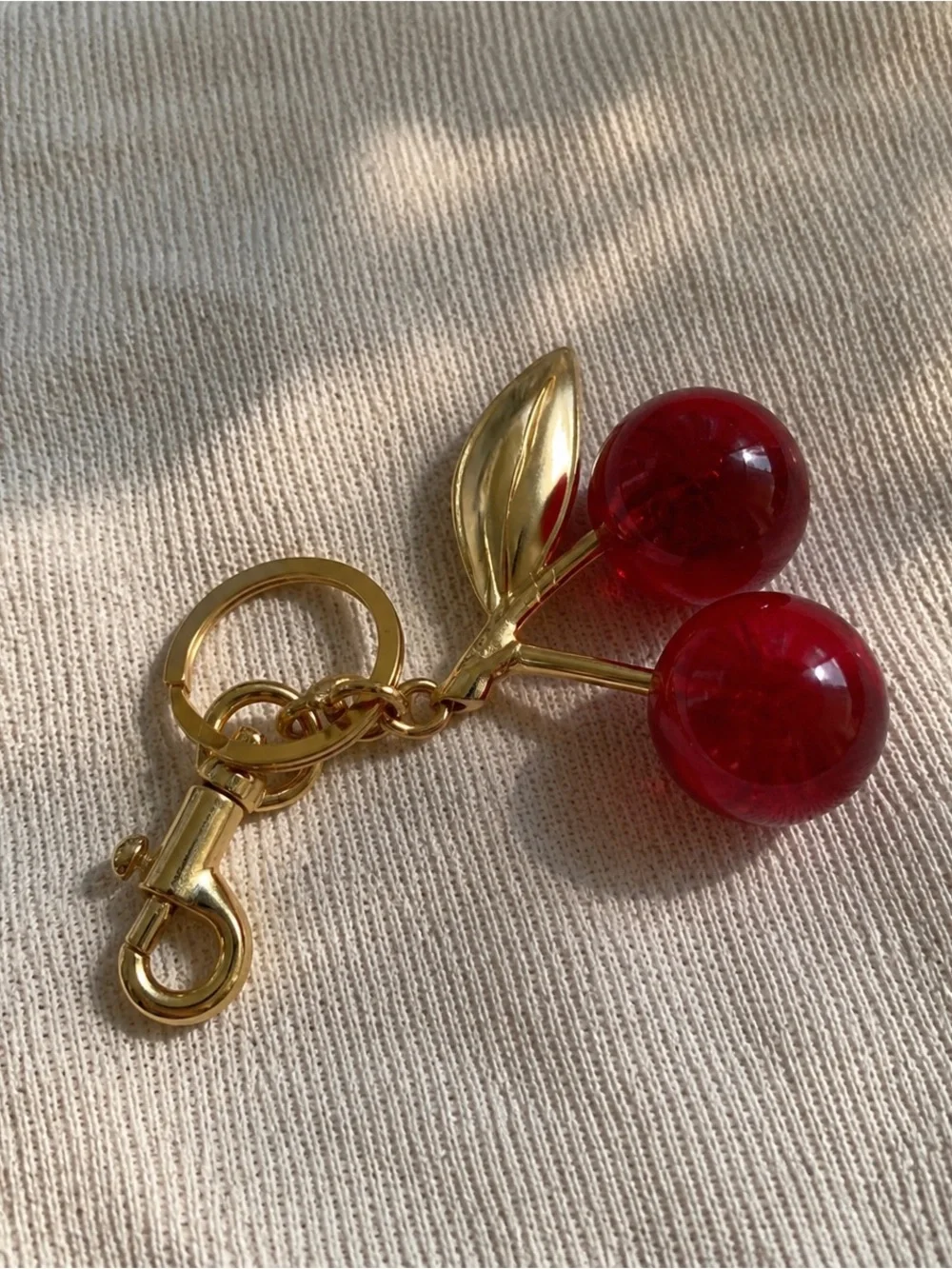 Coach Gold-tone Cherry Keychain with Red Lucite Cherries